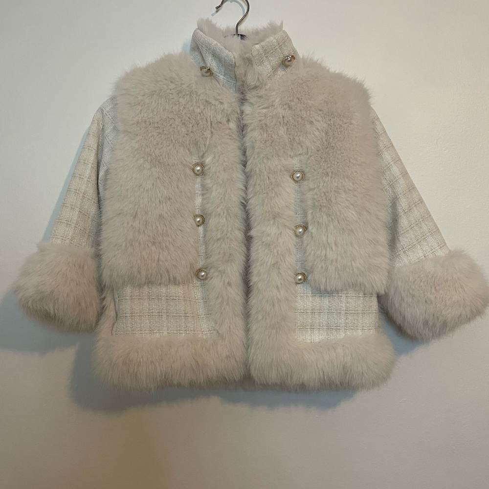 Girl ivory coat 8-9years old
